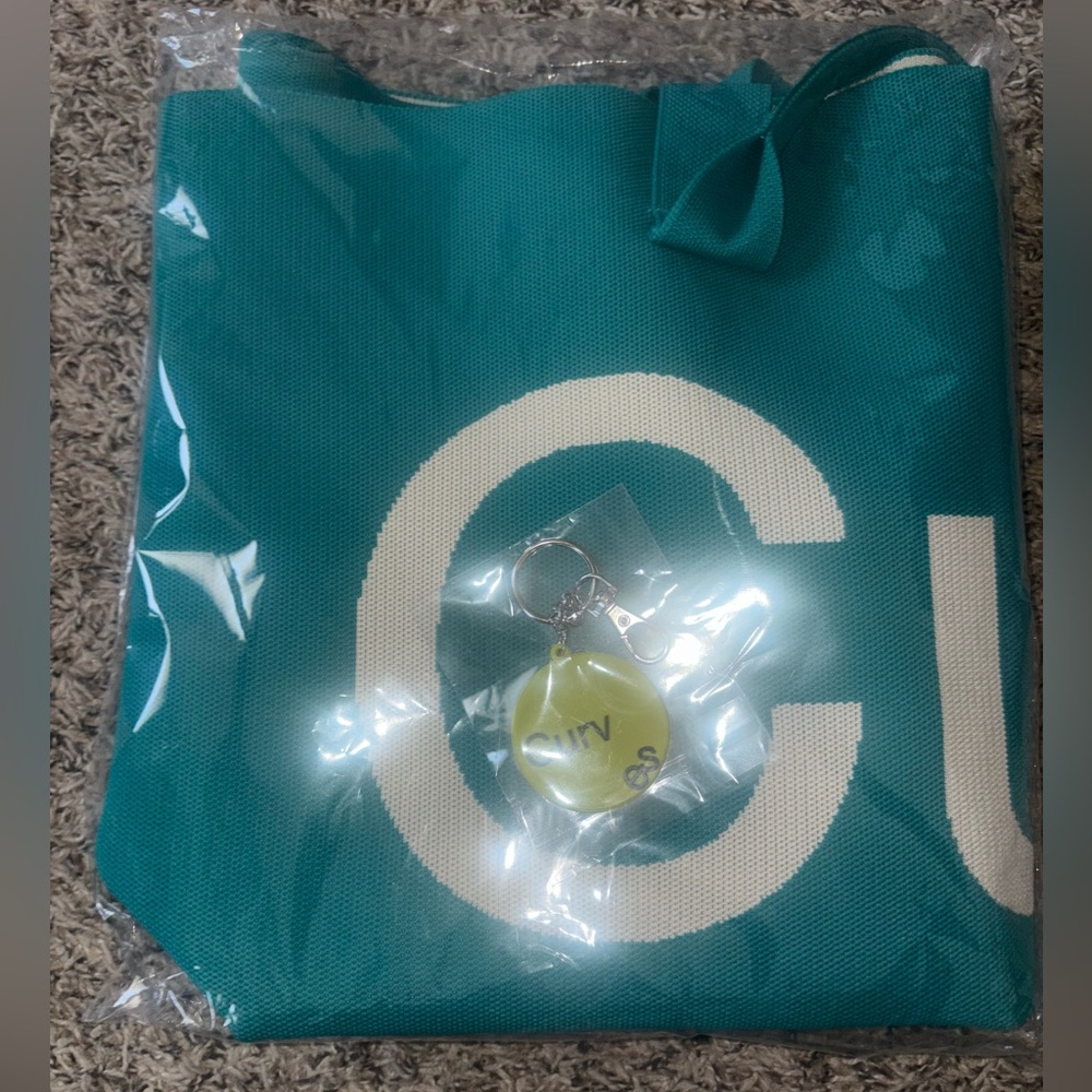 Turquoise Canvas Tote Bag with White Lettering